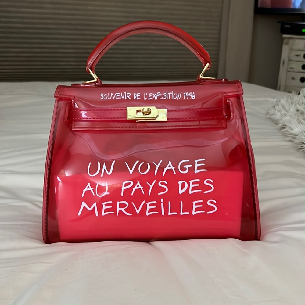 Never used red clear bag